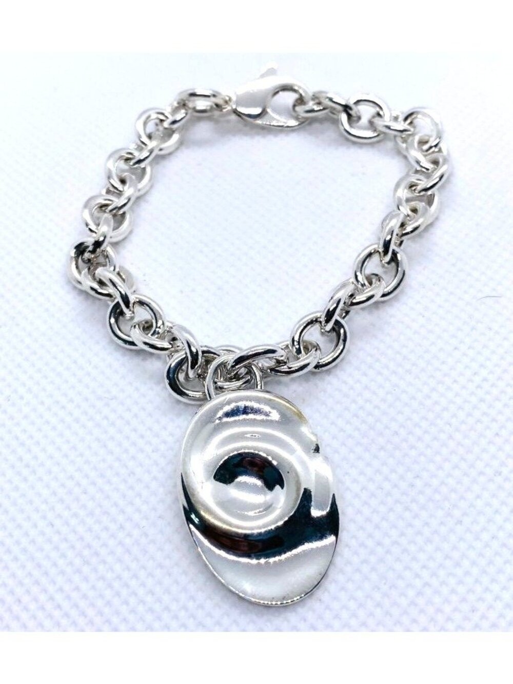 Tiffany & Co Silver Rolo Bracelet with Zodiac Aquarius charm 7.5"